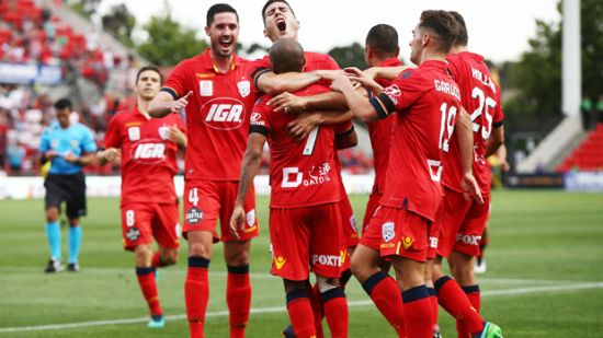 Henrique brace helps Reds to maiden victory