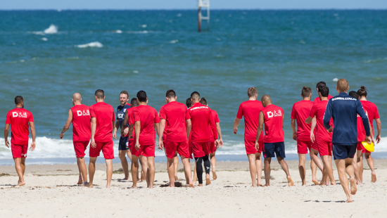 Gallery: Reds trade turf for surf